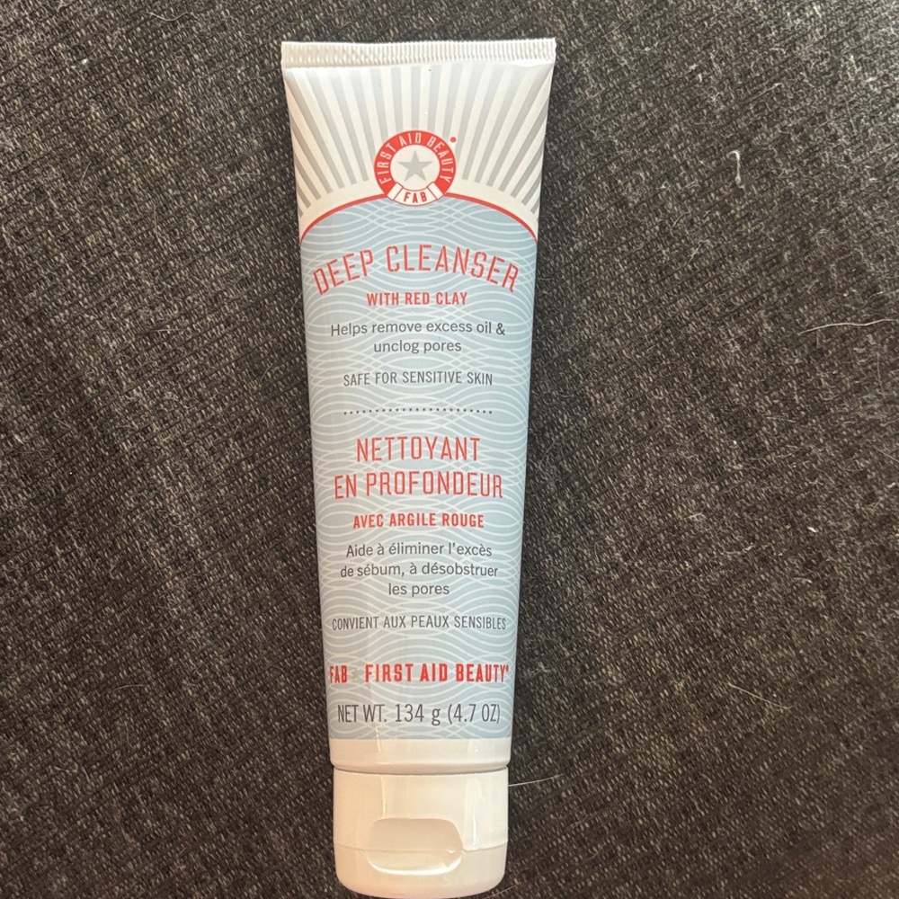 First Aid Beauty Cleanser with Red and White Design